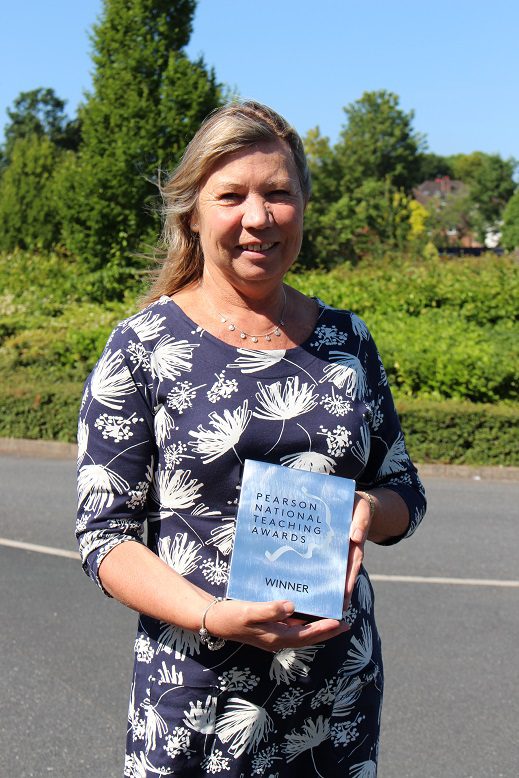 Sue with her award.