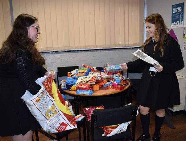Students sort through the donations.