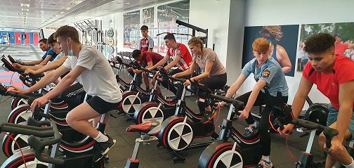 The students are put through their paces on some of the high-tech equipment.