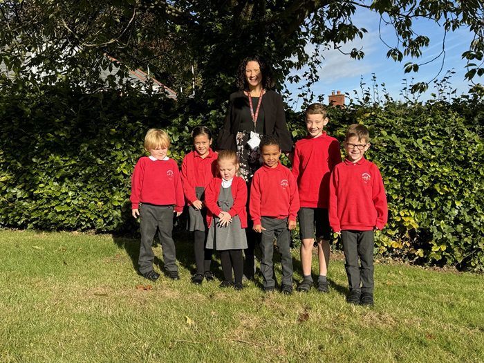 Ellie Ballinger, with students from Greysbrooke Primaery School.